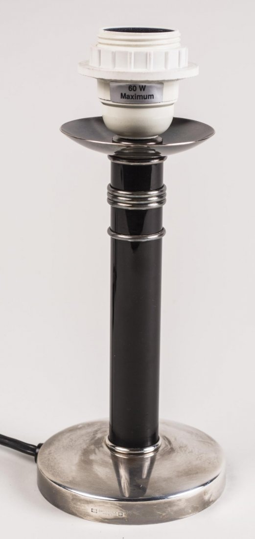 Christofle Lacquered Candlestick Lamp: Black lacquer and silver plated lamp.. Height 9 1/4 inches. Notice to bidders: Condition reports and additional photographs are provided by request as a courtesy to our clients, as such any condition 