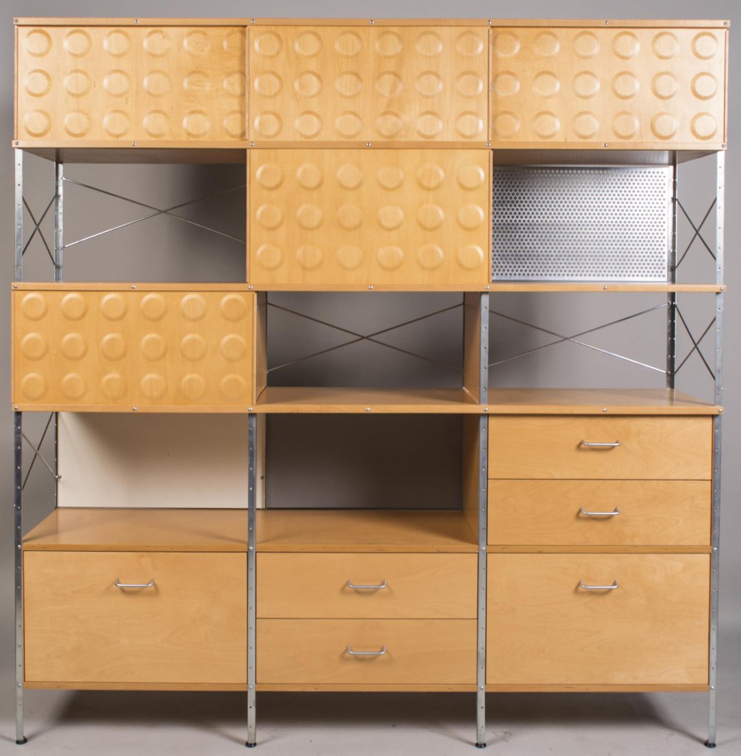 Modernica Case Study Bookcase Wall Unit: In the style of Herman Miller, open shelves, some with sliding doors and an arrangement of drawers. Height 72 inches, width 71 inches, depth 17 inches. Notice to bidders: Condition reports and additio