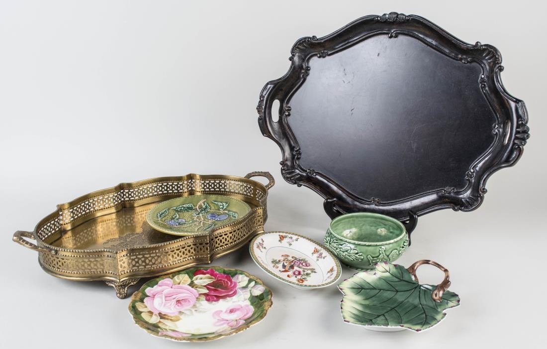 Group of Table Decorations: Two trays and assorted ceramic dishes. Various sizes. Notice to bidders: Condition reports and additional photographs are provided by request as a courtesy to our clients, as such any condition report