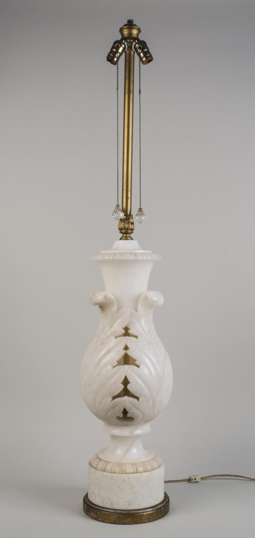 Marble Floor Lamp: Neoclassical style two light lamp, urn shaped with carved acanthus leaf decoration. Base, height 28 inches. Notice to bidders: Condition reports and additional photographs are provided by request as a