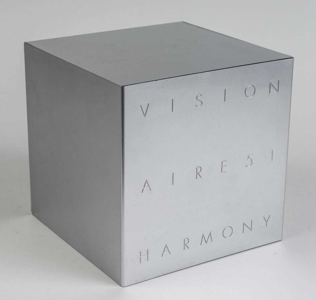 Visionaire 51 - Harmony: In collaboration with Lexus, three double sided puzzles featuring the works of Robert Wilson, Maurizio Cattelan, Vik Muniz, Massimo Vitali, Yayoi Kusama, and Richard Misrach. Visionaire Publishing LLC