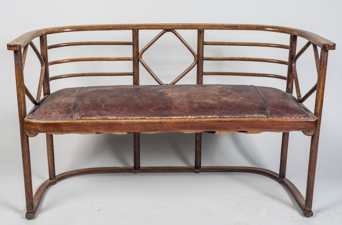 Josef Hoffman Furniture Suite: Settee and two chairs, each with horseshoe crest, open back and original leather seat, on conforming base. Height 30 inches, width 48 inches, depth 20 inches. Notice to bidders: Condition reports and