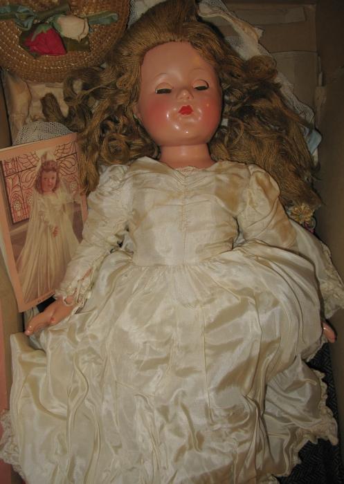Vintage Circa 1935 Effanbee Little Lady Bride Doll: marked "Ann Shirley" on back torso. Hard plastic head, Composition body, full bridal costume w orig shoes and stockings. Height?)