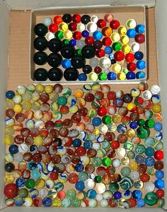 Box of over 100 marbles: various sizes and colors.