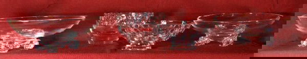 Four pieces of glass: including: two low-footed bowls 8" dia., signed Steuben; crystal bowl, Tiffany & Co.; Lobed bowl Orrefors.