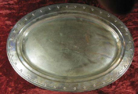 Oval sterling silver tray: Tiffany & Co., approximately 57 troy oz., 17 7/8" x 13", initials "NGR"