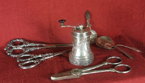 Seven sterling pieces: including: three fruit scissors, two marked sterling one plated "Barden Club"; three fruit serving spoons; sterling pepper grinder (English?).