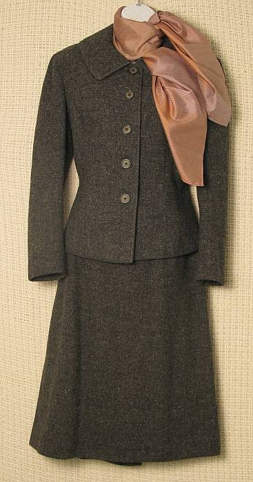 Vintage 60's Vera Maxwell Wool Suit: Classic A line deep charcoal salt & pepper worsted wool five button suit. Silk lined jacket, half lined skirt. W 29" Hips 38" Bust 38".Original labels in skirt. Frank Larson silk scarf signed, Thai si
