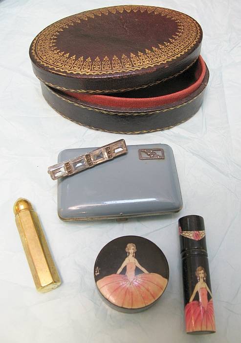 Tita Art Deco Purse/Vanity Lot: Vintage 1920's hand painted celluloid powder compact and perfume vial case (with crystal stopper) girl in pink gown on black background. Signed Tita on both pieces. Deco sterling and crystal bar pin.D