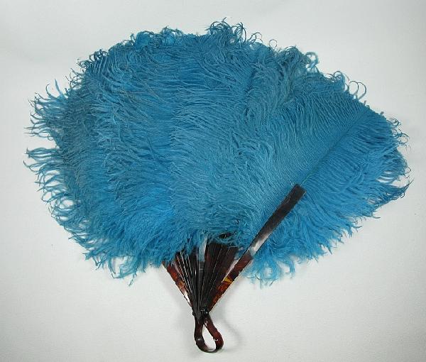 Ostrich feather fan: with tortoise-shell, dyed ostrich feathers, late 19th century.