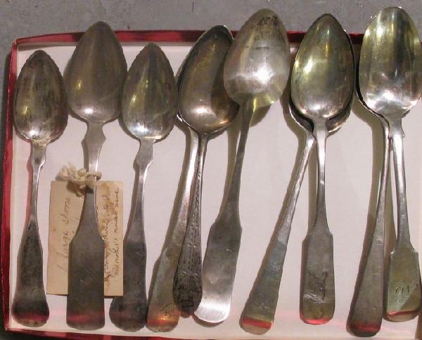 Ten coin silver serving spoons: various makers including: J.M. BARROW, N. HARDING, HUTTON, MOULTON, PALMER & BACHELDER'S, D.V. VOORHIS. Provenance: Lucy H. Williams