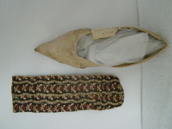 2 piece clothing lot: 18th century lady's shoe and early hand stitched fabric belonging to Sally Morrison
