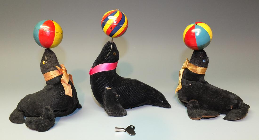 3 MASUDAYA JAPAN WINDUP PERFORMING SEALS (1 of 2)
