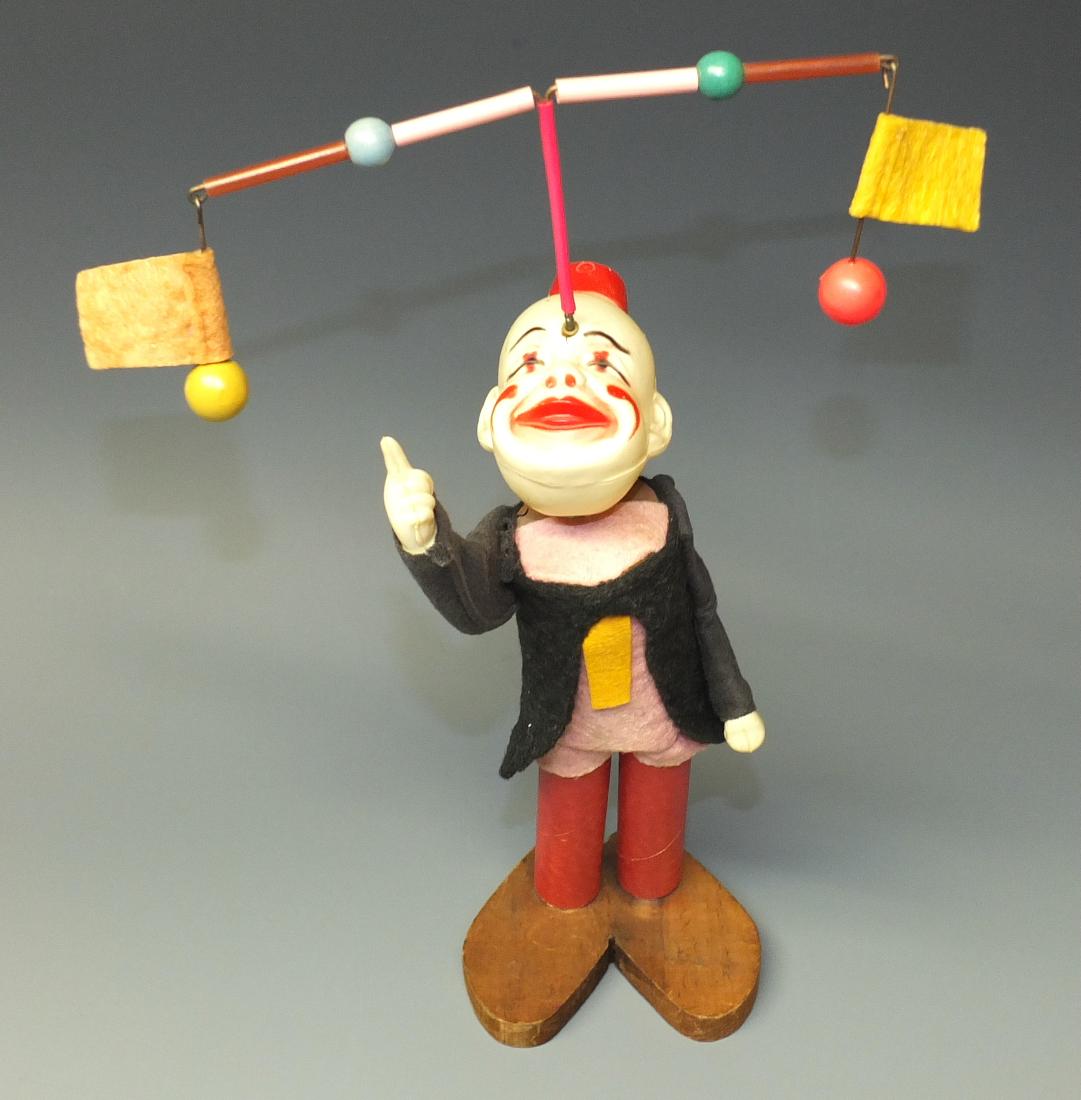 IRWIN O LOOK CELLULOID WINDUP JUGGLING CLOWN