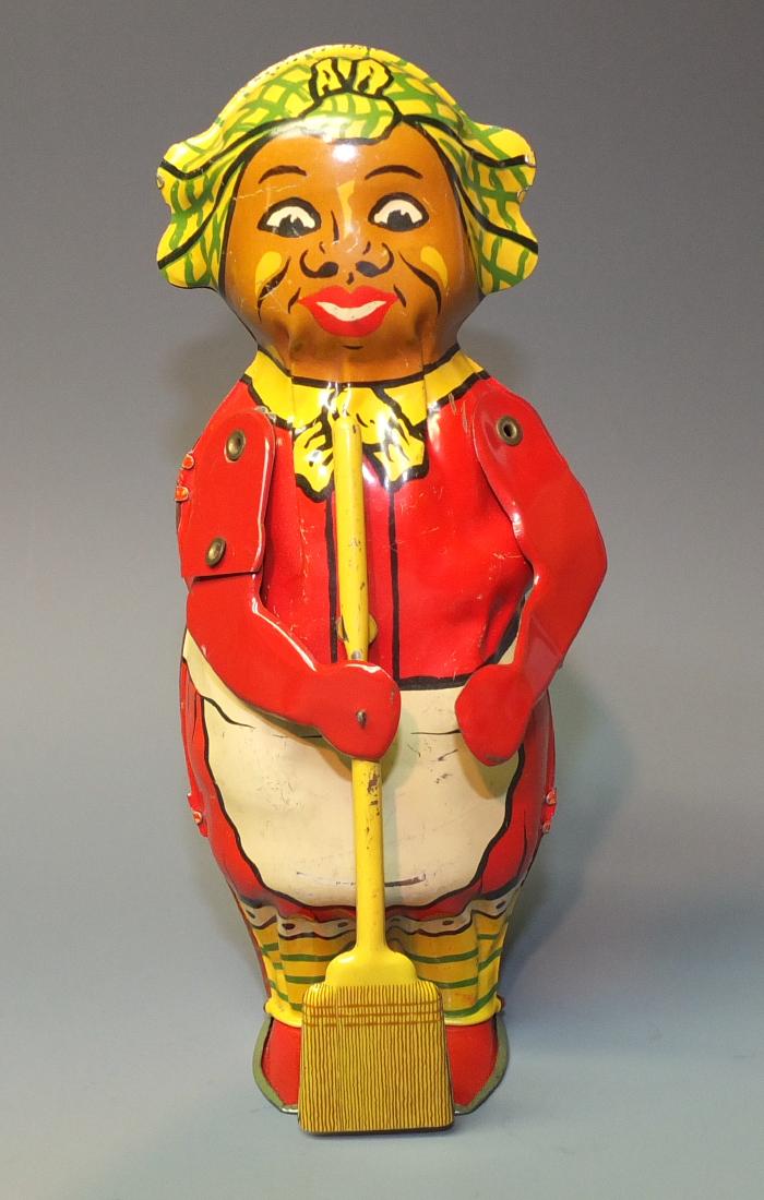 LINDSTROM SWEEPING MAMMY TIN WINDUP: Made in USA by Lindstrom. Scarce Early Colorfully Lithographed Mechanical Windup Toy. 1940's 8" H