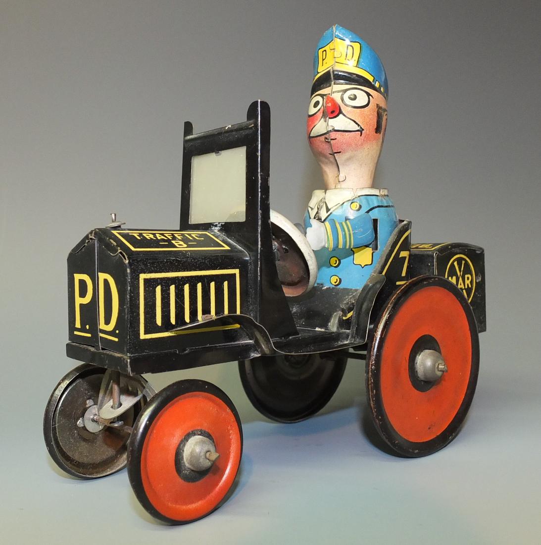 MARX KOMIKAL KOP TIN WINDUP ECCENTRIC CAR (1 of 7)