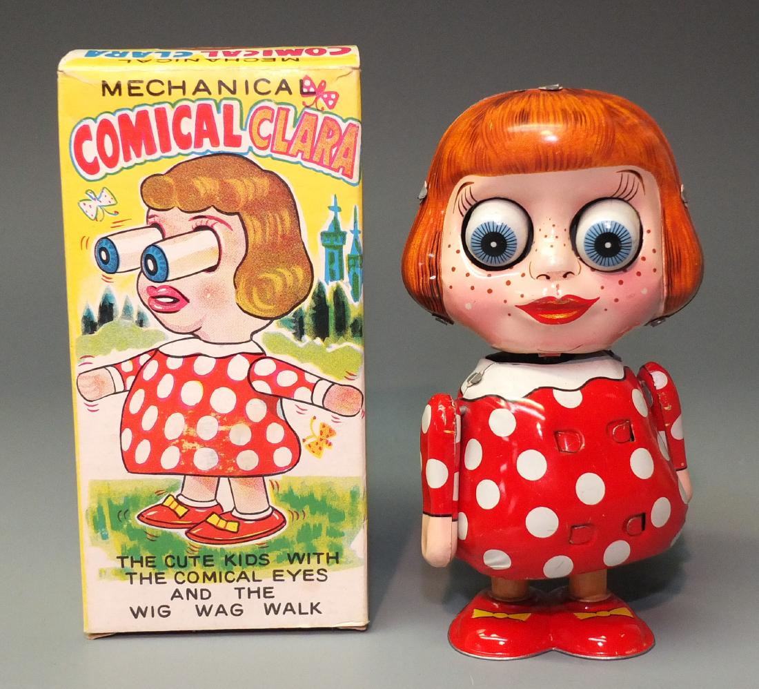 TPS JAPAN COMICAL CLARA TIN WINDUP & BOX (1 of 7)