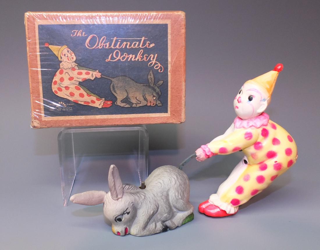 WINDUP CELLULOID CLOWN PULLED BY DONKEY & BOX (1 of 6)