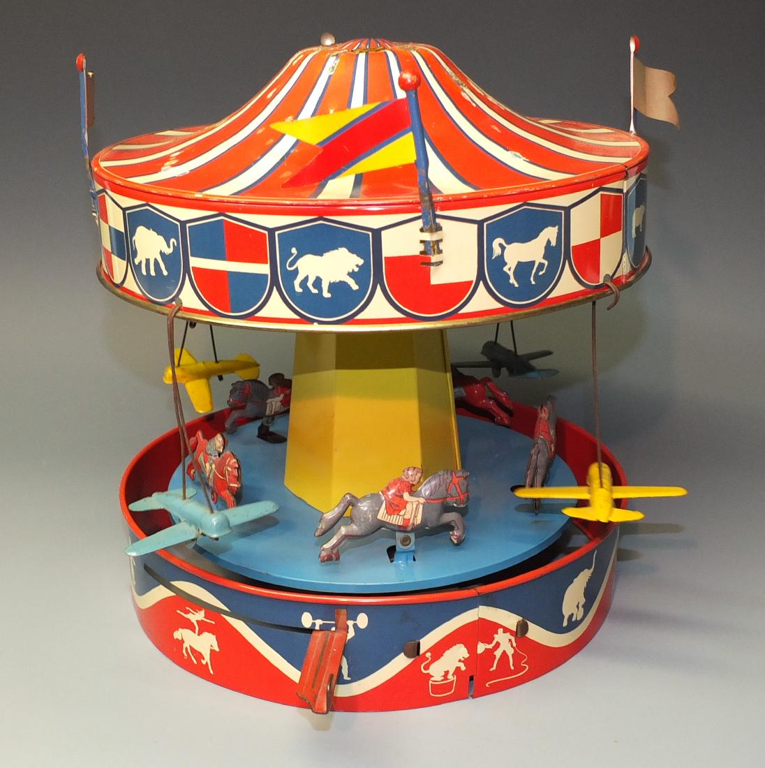 WOLVERINE MERRY GO ROUND TIN WINDUP (1 of 6)