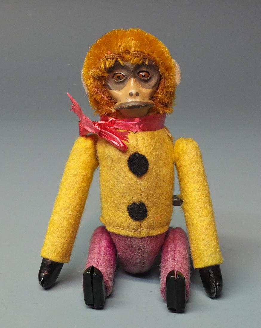 SCHUCO GERMAN 877 TURN TUMBLING MONKEY TIN WINDUP (1 of 4)