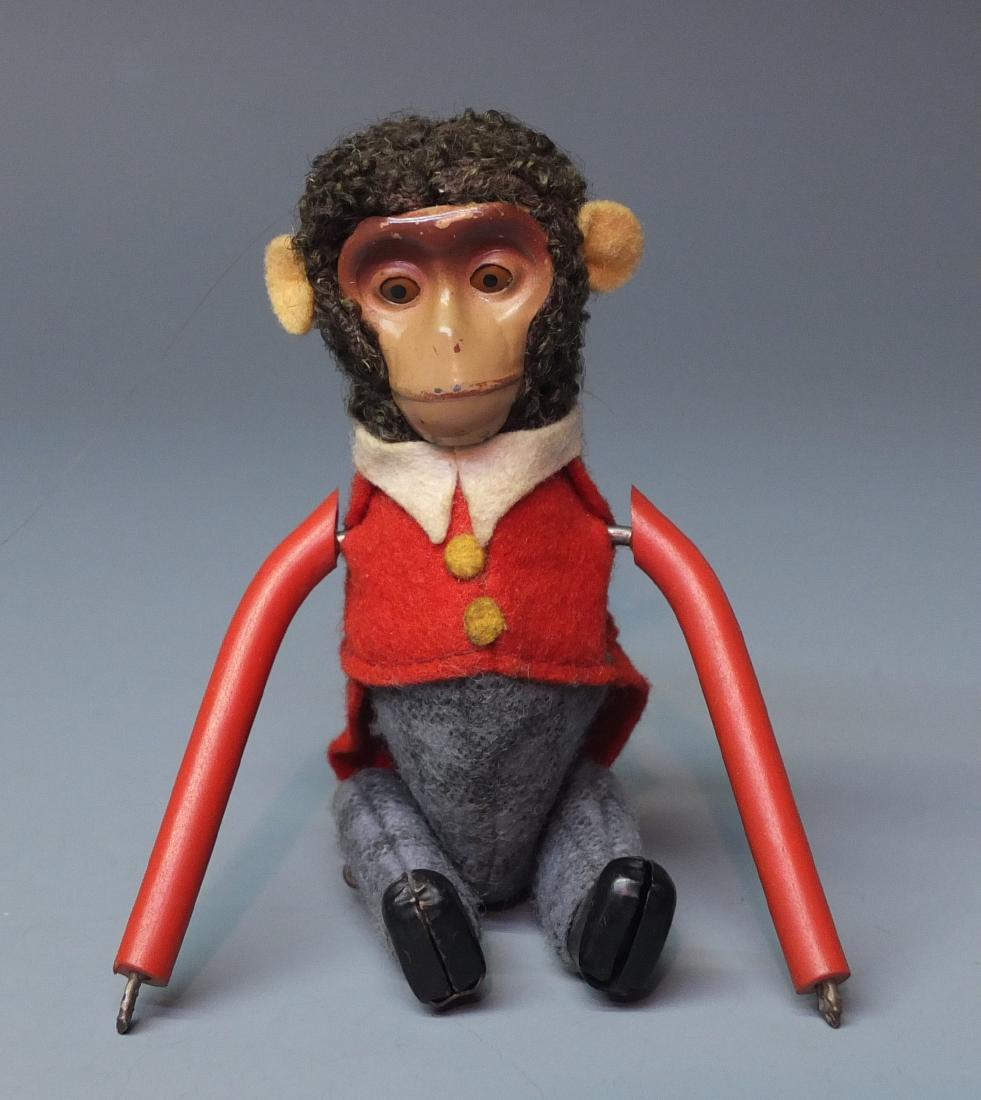 SCHUCO GERMAN 889 LARGE GYMNASTIC MONKEY ACROBAT TIN (1 of 4)
