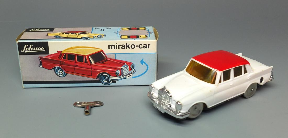 SCHUCO GERMAN 1001/1 MIRAKO CAR WIND UP CAR & BOX: Made in Western Germany by Schuco. 1960's windup 1001/1 Mirakocar Mercedes with non fall table top action. Comes with key & original box 4.5" long.