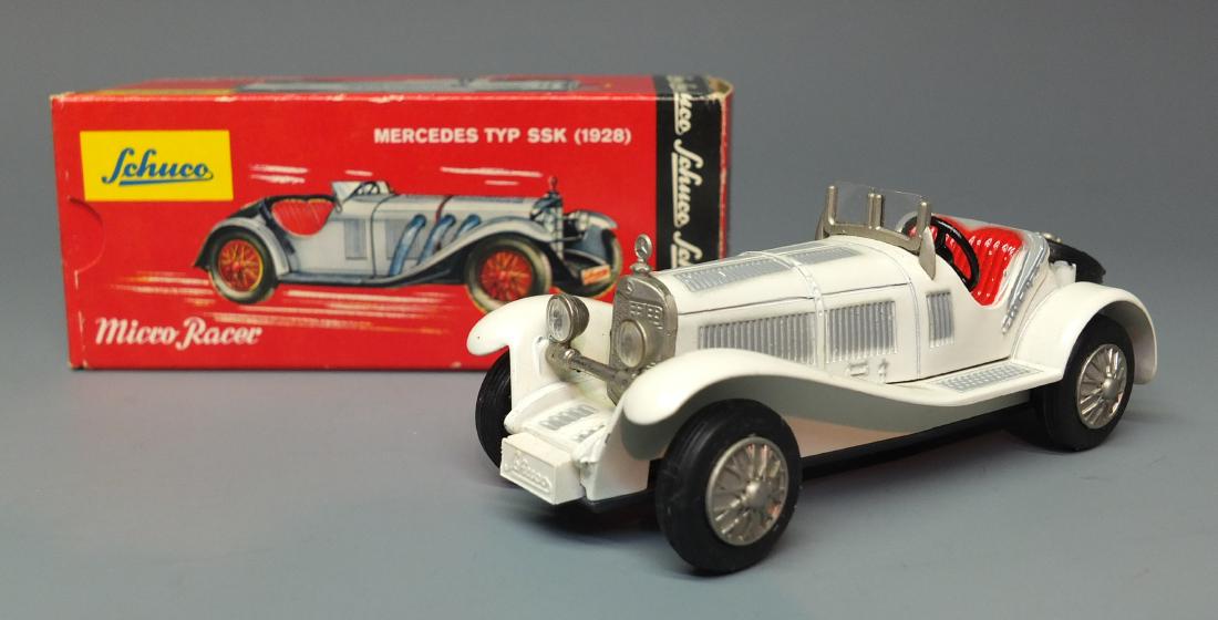 SCHUCO GERMAN 1043/1 1928 MERCEDES SSK WIND UP MICRO: Made in Western Germany by Schuco. 1950's steerable windup 1043/1 1928 Mercedes TYP SSK car micro racer. Comes with original box. 4.5" long.