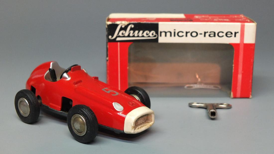 SCHUCO GERMAN 1043 MERCEDES 2,5 L WIND UP MICRO RACER &: Made in Western Germany by Schuco. Scarce & hard to find 1950's steerable windup 1043 Mercedes 2.5 l car micro racer. Comes with key & original box. 4" long.