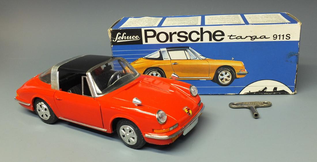 SCHUCO GERMAN 1081 PORSCHE 911 S WIND UP CAR & BOX: Made in Western Germany by Schuco. 1960's windup or friction 1081 Porsche 911 s targa car. Comes with key & original box. 9" long.