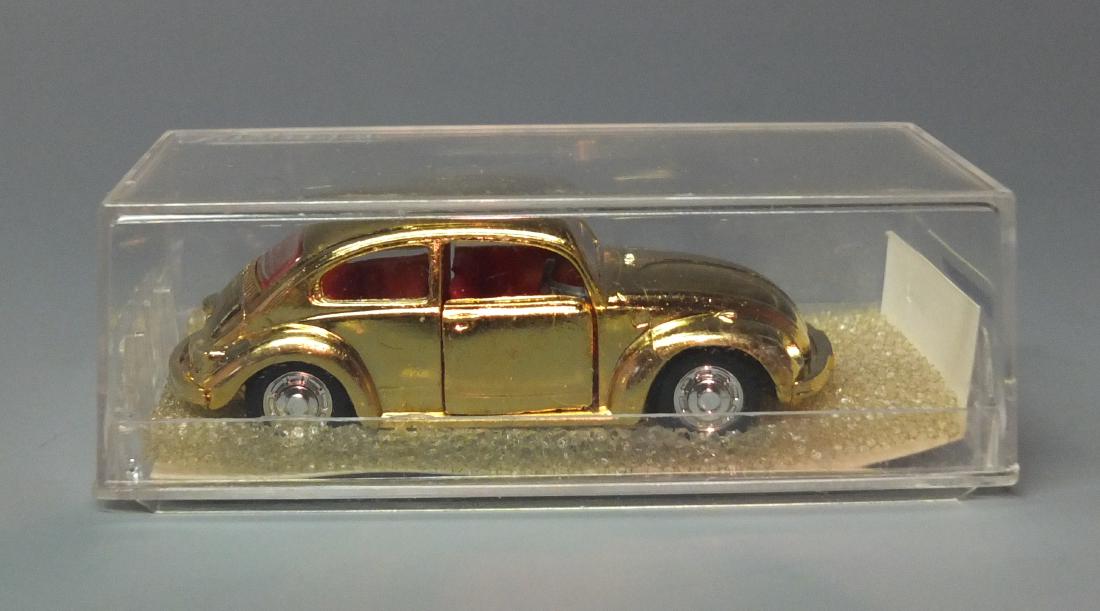 SCHUCO 1974 INTL TOY SHOW GOLD PICCOLO VW BUG (1 of 9)