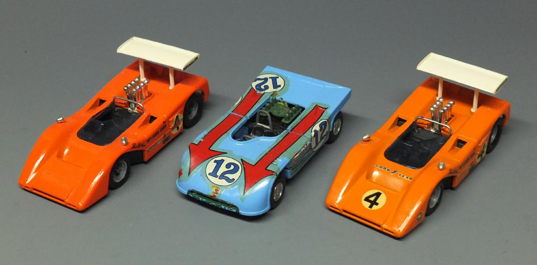 3 MERCURY & SOLIDO RACE CARS: Lot of Three (3) Vintage 1/43 Scale Diecast Racers includes: Mercury Porsche 908/03 car (Italy) and Two (2) Solido Mc Laren M8B Can Am cars (France).