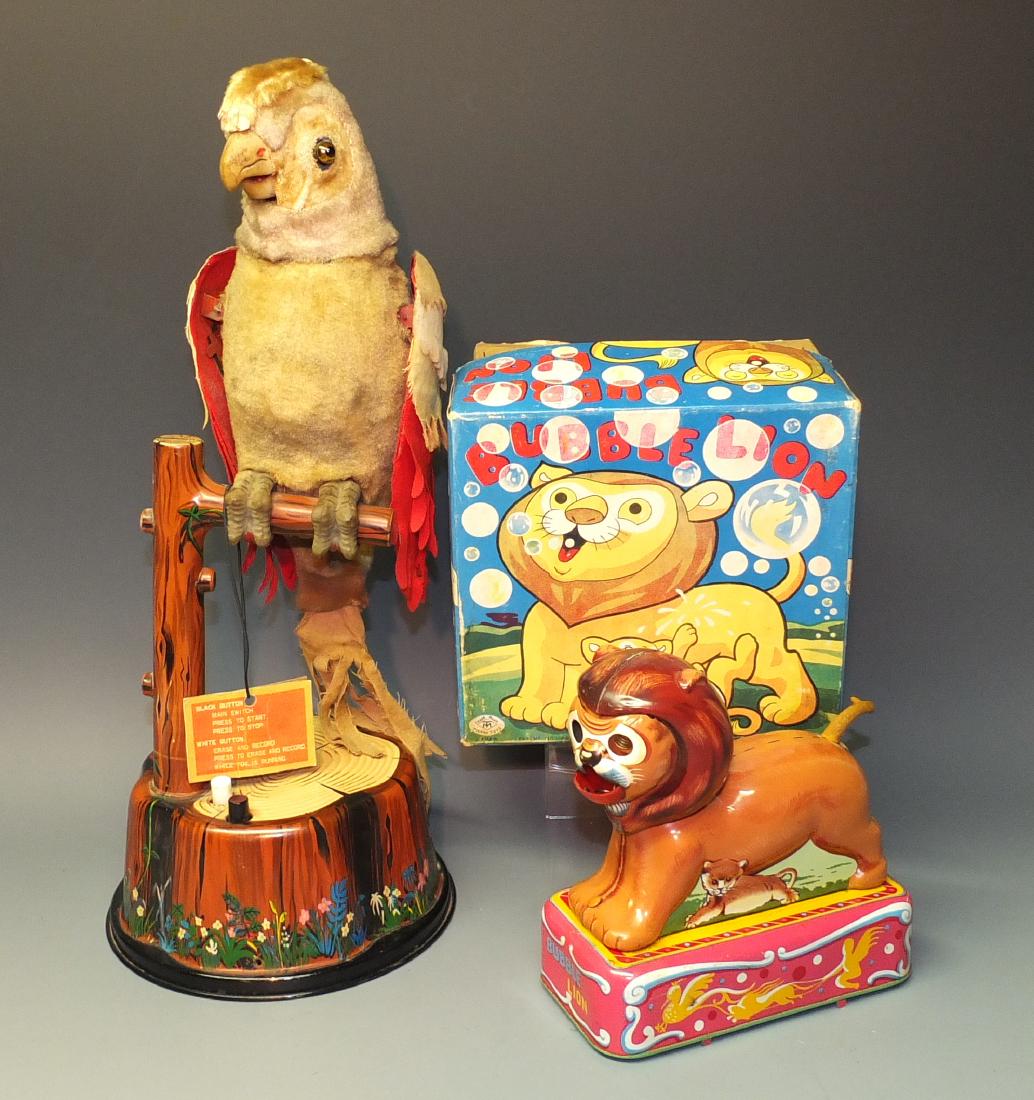 2 VINTAGE TIN BATTERY OPERATED TOYS: Lot of two (2) vintage 1950's tin battery operated toys (Made in Japan) includes: Marx Talking Pete the Parrot (18" high) (Rusted Battery Compartment & Not Working, Otherwise Excellent) and MT Bubble 