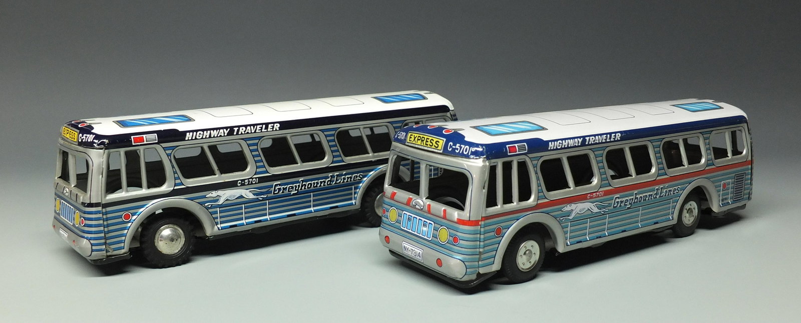 2 TIN FRICTION GREYHOUND BUSES: Made in Japan. Lot of 2 Highly Detailed Tin Litho Friction Buses Includes 2 Versions of the Same Bus w/ Different Litho & Hub Caps. 10.25" L