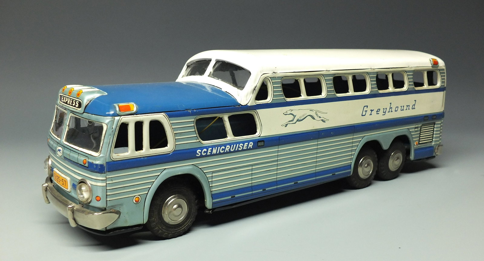 TIN BATTERY OP SCENICRUISER GREYHOUND BUS: Made in Japan by KTS. Rare & Hard to Find Highly Detailed Tin Battery Operated Version Scenicruiser Bus. Bus is Untested & Has a Loose, Unattached Switch. 14" L