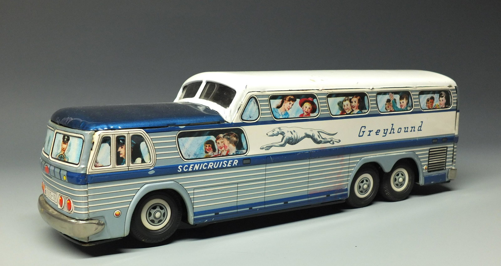 TIN BATTERY OP SCENICRUISER GREYHOUND BUS: Made in Japan. Highly Detailed Tin Litho Battery Operated Scenicruiser Bus w/ Mystery Action. 14" L