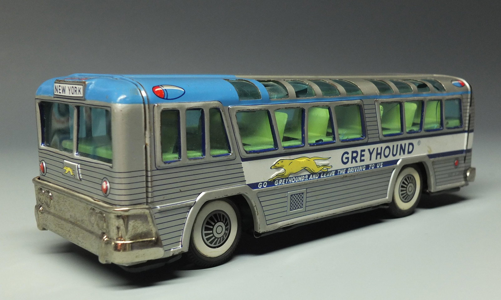 TIN FRICTION GREYHOUND BUS: Made in Japan. Highly Detailed Tin Litho Friction Bus w/ Observation Windows. 9" L