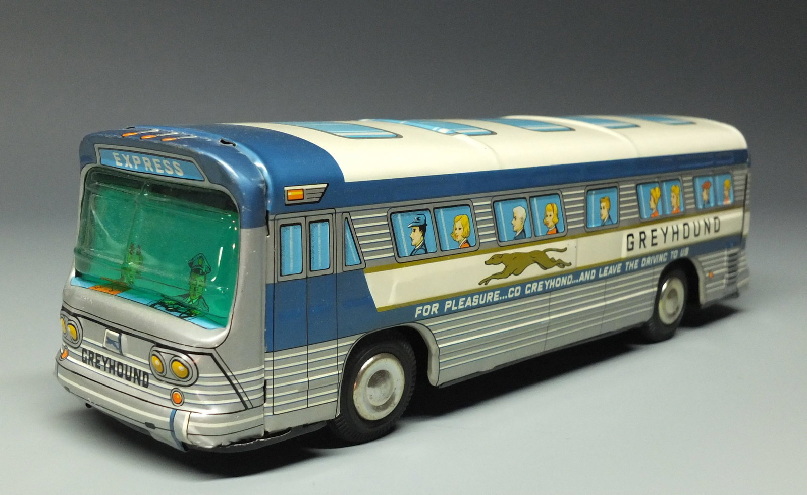 TIN FRICTION FISHBOWL GREYHOUND BUS: Made in Japan. Highly Detailed Tin Litho Friction Fishbowl Bus. 11" L