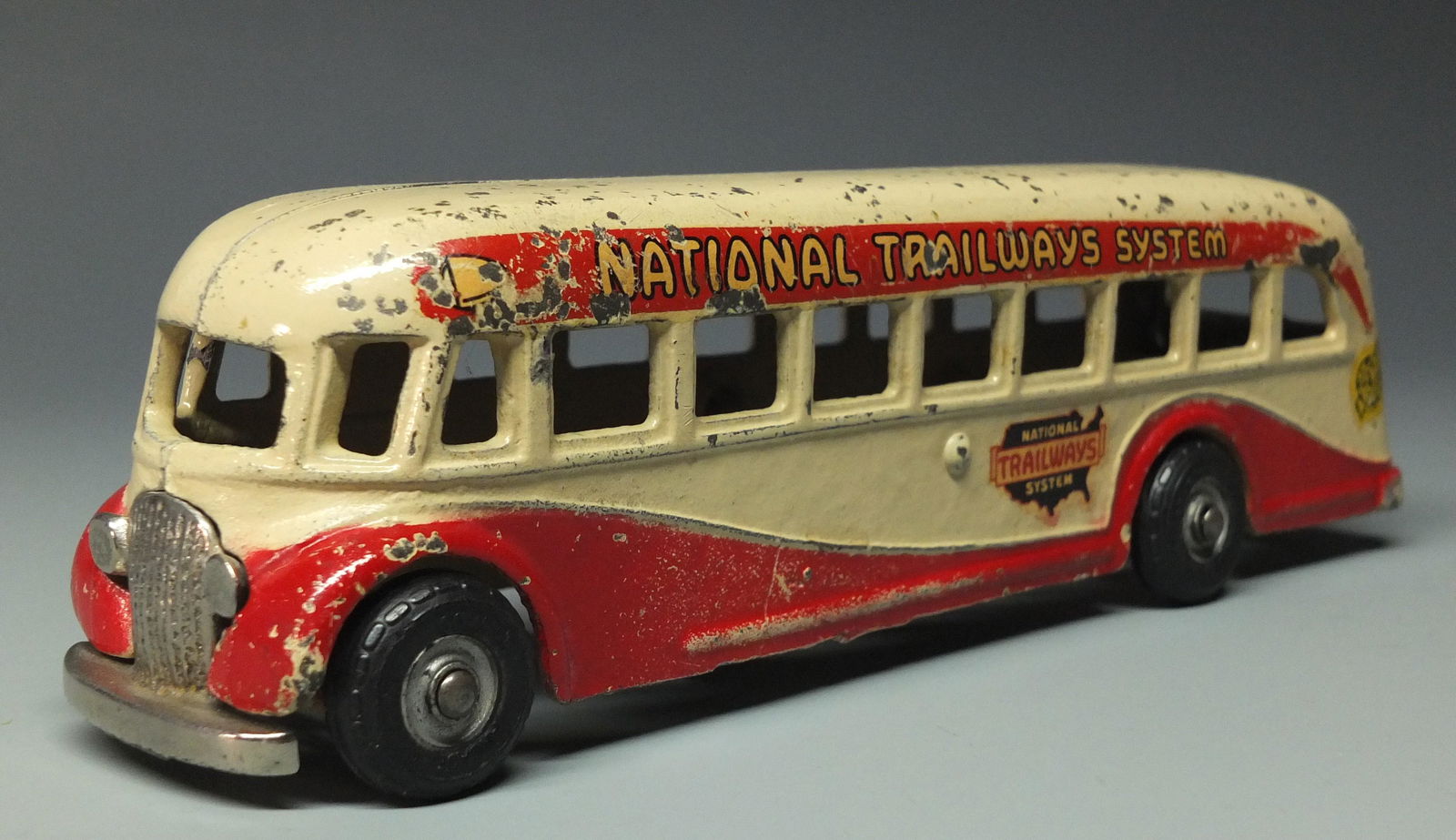 ARCADE NATIONAL TRAILWAYS CAST IRON BUS: Scarce & Hard to Find 1940's Arcade Cast Iron National Trailways System Bus w/ Original Trailways & Arcade Decals and Nickel Grill & Rear. 9" L