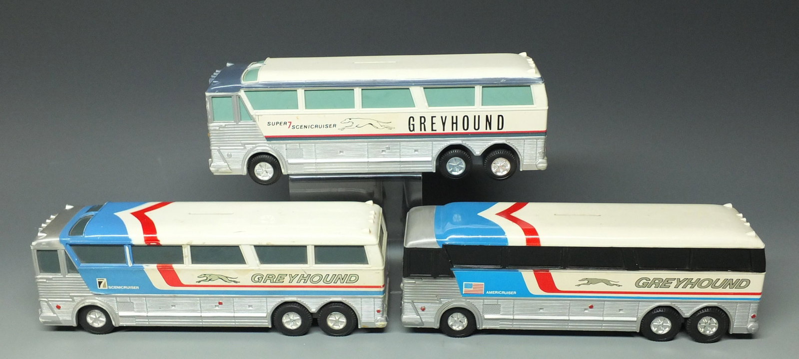 3 VINTAGE JIMSON BUS BANKS: Lot of 3 Plastic Very Rare Jimson Vintage Bus Banks Includes: 3 Different #220 Super 7 Scenicruisers (1 Is Missing the Coin Trap). Approx. 10" L