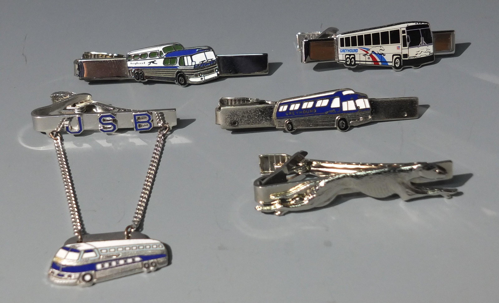 5 GREYHOUND BUS TIE CLIPS: 5 Greyhound Bus Tie Clips.