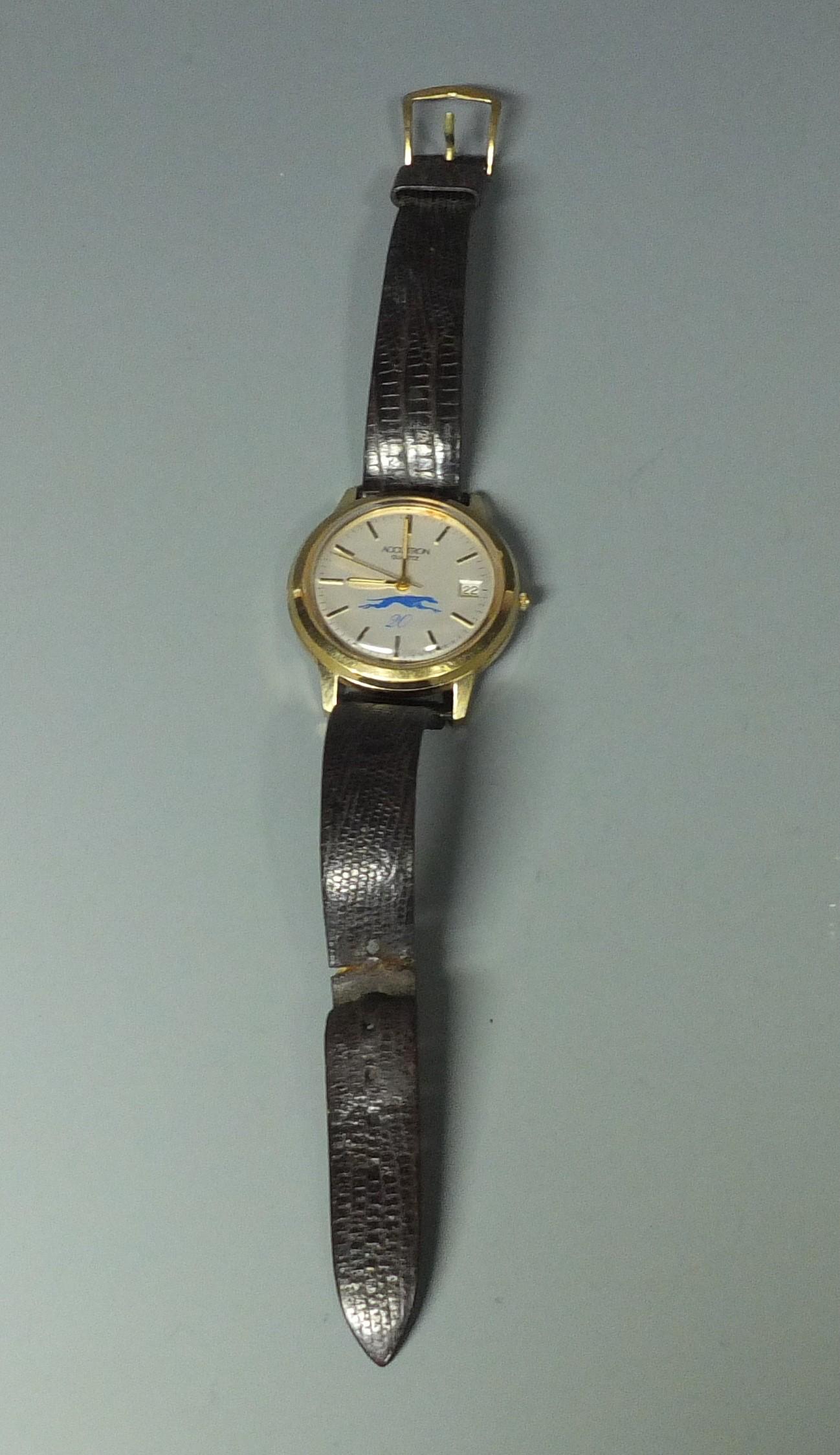 BULOVA GREYHOUND 20 YEAR SERVICE SWISS WATCH: Bulova P2 Accutron Quartz Greyhound Bus 20 Years of Service Swiss Wristwatch w/Leather Band.