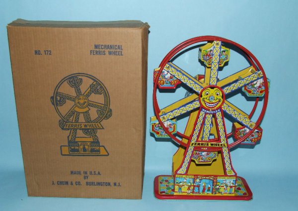 CHEIN FERRIS WHEEL # 172 TIN WIND UP TOY & BOX: 1950's. USA. Working. Complete. All Original. Extremely fine example of this classic amusement park toy & box. Base: 11" W x 4.75" D. 17" H. (NM+). OB Complete. (NM).