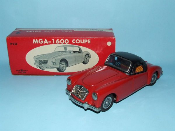BANDAI MGA 1600 MARK II COUPE FRICTION CAR & BOX: 1960's. Japan. Working. Complete. All Original. #920, tin construction, authentic detail, friction motor, rubber tires, black roof. 8.5" L. (NM+). OB complete. (NM).