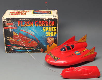 VINTAGE FLASH GORDON RC SPACE SHIP & BOX: Vintage Flash Gordon Space Ship Plastic Battery Operated, Radio Remote Controlled Toy in Original Box. Never been played with. Untested. 7" L.