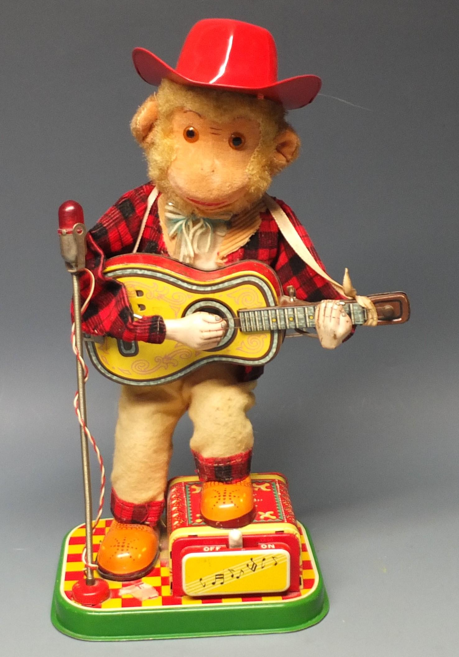 Vintage Alps Rock N Roll Monkey Playing Guitar