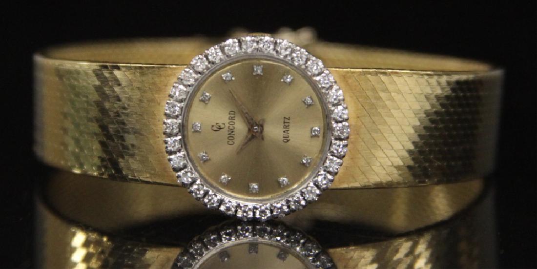 CONCORD COLLECTION 18KT GOLD WATCH W/DIAMOND BEZEL: Including- original box. Weight- 43.6 grams Condition- scratched and twisted band. In-house shipping available within continental U.S. for $15 plus insurance.