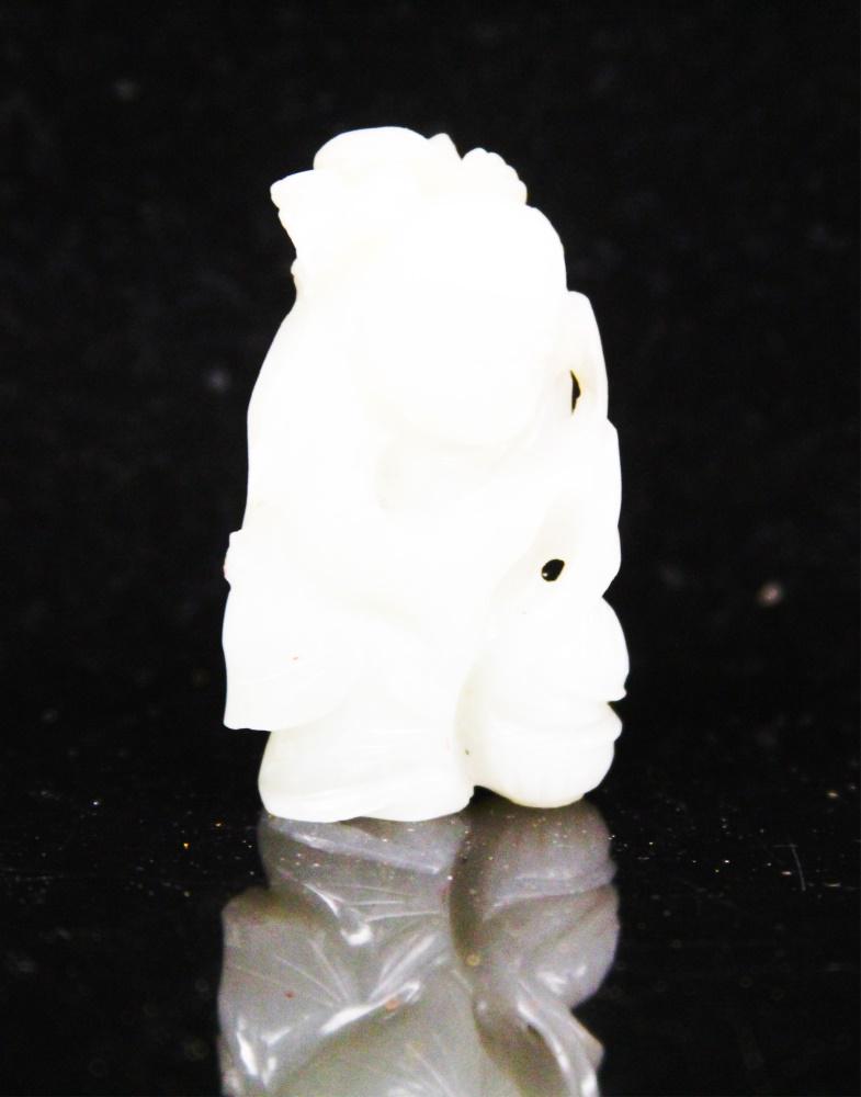 CHINESE CARVED JADE FIGURE OF BOY, 19TH C. (1 of 3)