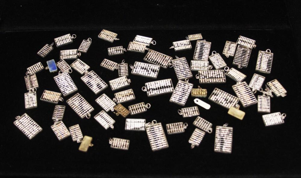 LOT OF CHINESE SILVER CHARMS, ABACUS: Weight- 5 troy oz. In House Shipping within U.S. for $25 plus insurance Collection of The China Art Center of Carmel, CA