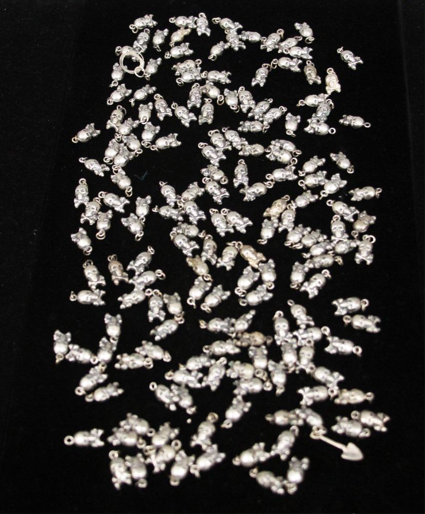 LOT OF SILVER CHARMS, SKULL AND BONES: Weight- 9.7 troy oz.. In House Shipping within U.S. for $25 plus insurance Collection of The China Art Center of Carmel, CA