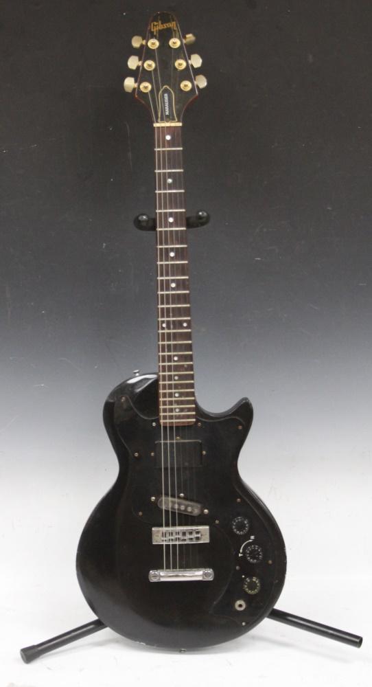 GIBSON MARAUDER 1981 GUITAR U.S.A: Black. Condition issues, non-original parts Serial number - 80771588 with case Third party shipping only